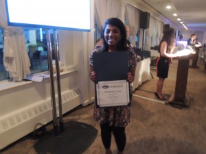 The Westbury Times/Hicksville Illustrated News editor Betsy Abraham was the big winner this evening. Here she is with her Third Place award for Narrative: Arts.