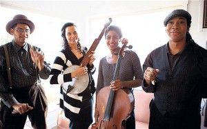 Leyla McCalla (second from right) as a member of the Carolina Chocolate Drops