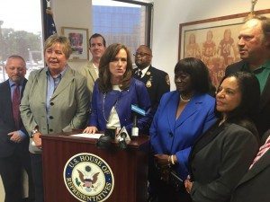 Town of Hempstead Supervisor Kate Murray (second from left), U.S. Representative Kathleen Rice (at podium) and Town of Hempstead Councilwoman Dorothy Goosby announcing that he U.S. Census Bureau has agreed to re-designate East Garden City as part of Uniondale.