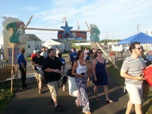 Folks file in to Great South Bay Music Festival for a day of good food, neat shopping and cool music. (Photo by Kimberly Dijkstra)