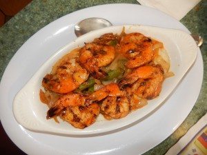 Biscuit’s shrimp and grits is deeply flavorful.