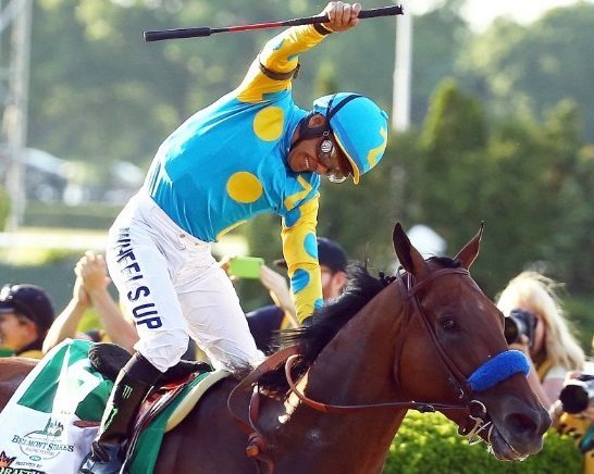 American Pharoah wins the Triple Crown at the 2015 Belmont Stakes.