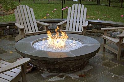 BayStovescustom HPC firepit with clear fire glass, cultured stone and bluestone