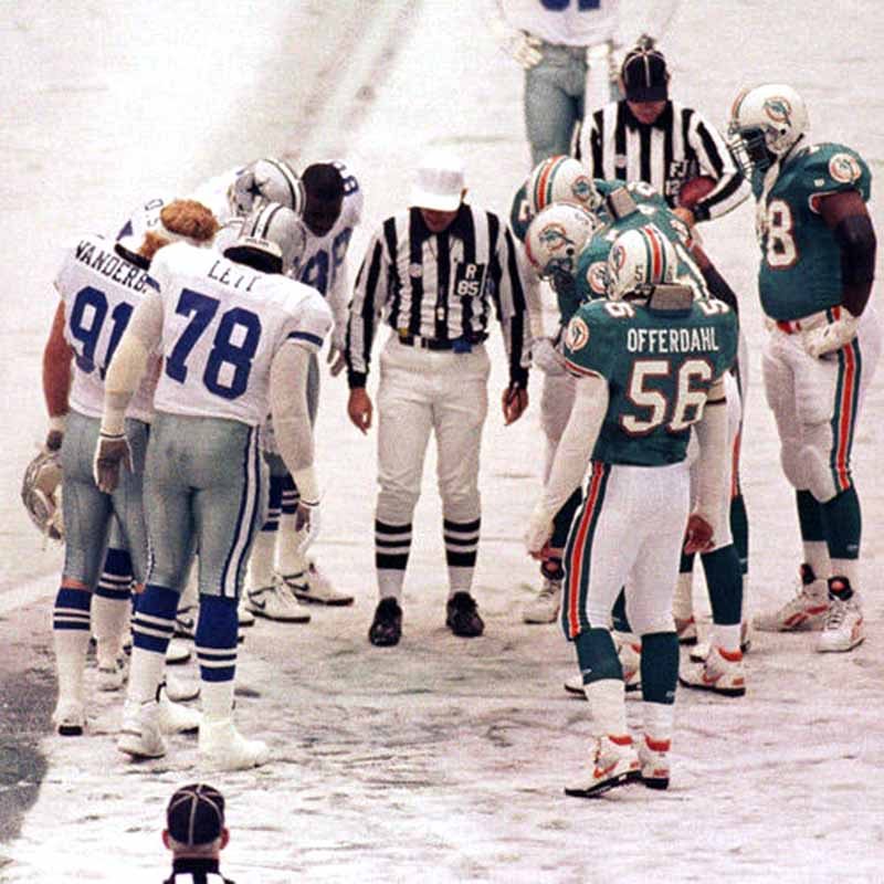 The Dallas Cowboys and Miami Dolphins meet on the icy field of Texas Stadiu...