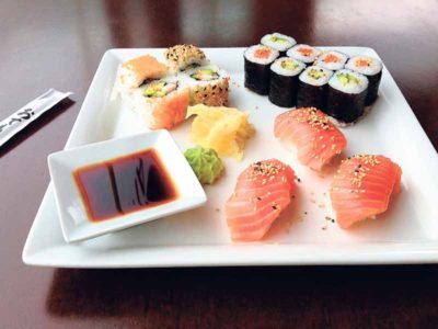 The menu includes a diverse selection of sushi. 